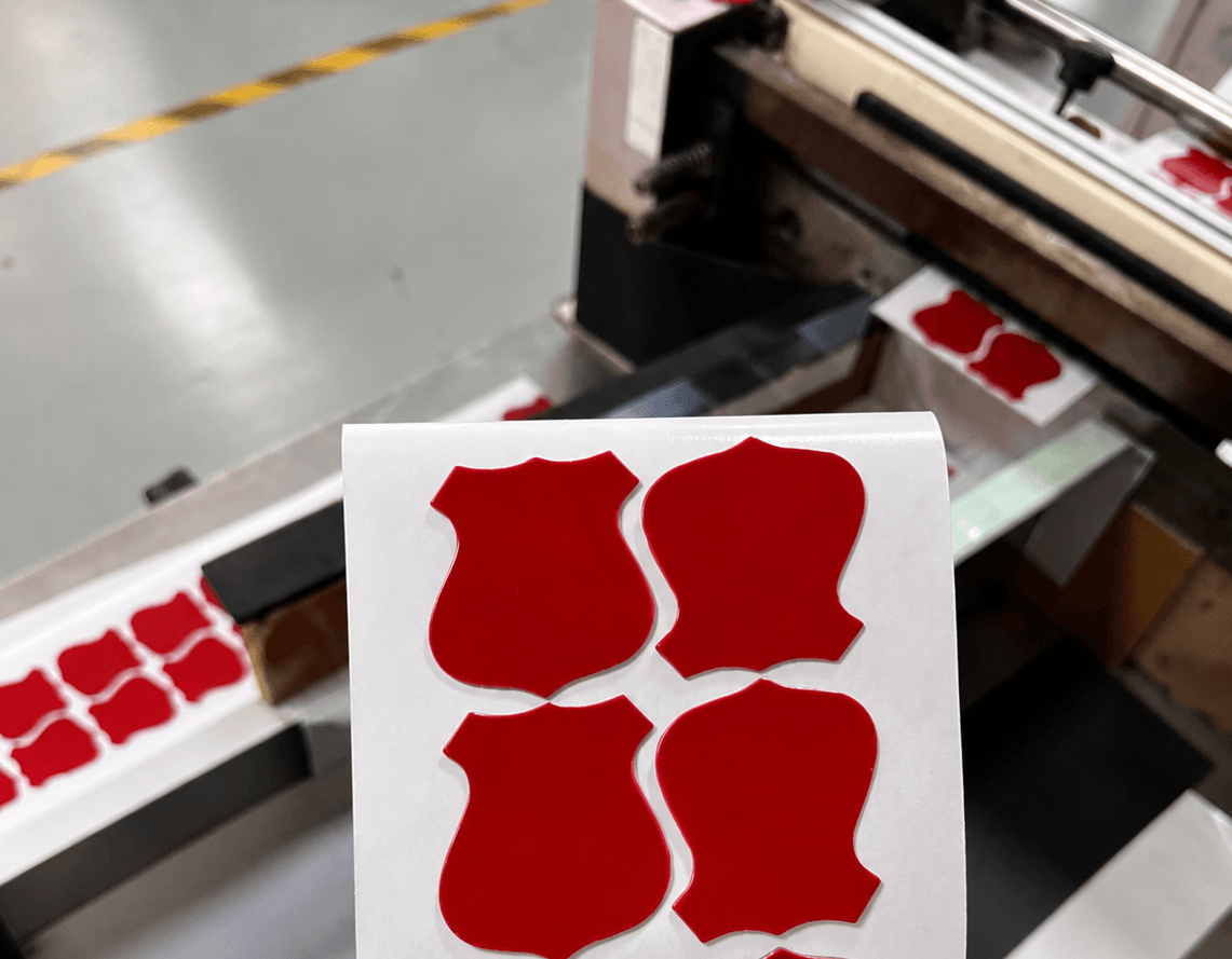 Tape slitting and die-cutting line