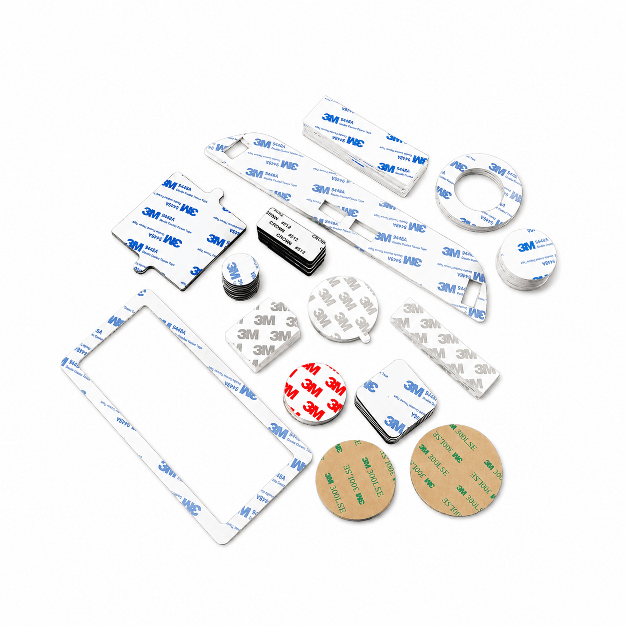 Die-cut double-sided adhesive pads on a red liner from nibaL