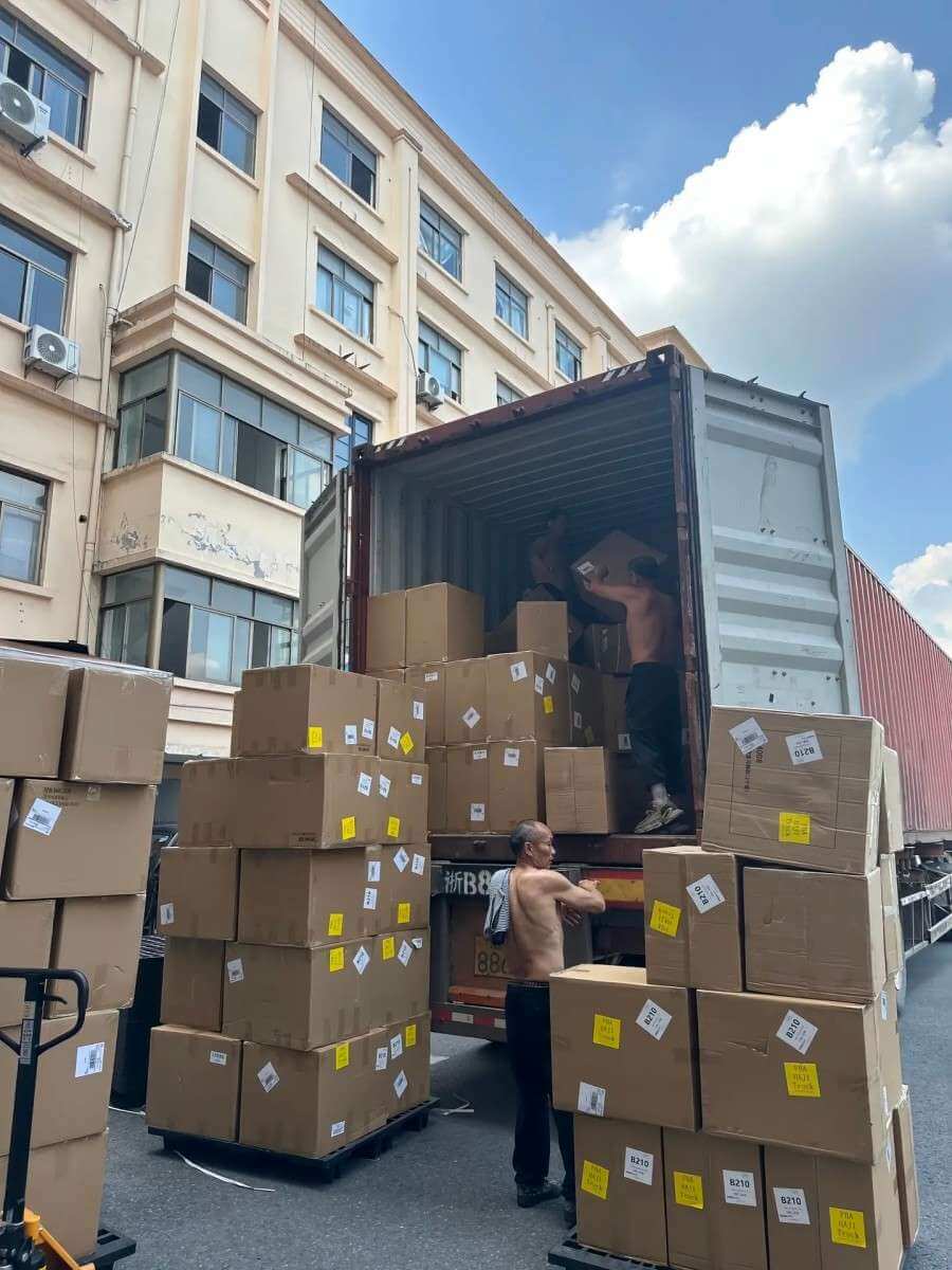 Loading adhesive tape cartons for export at the nibaL factory